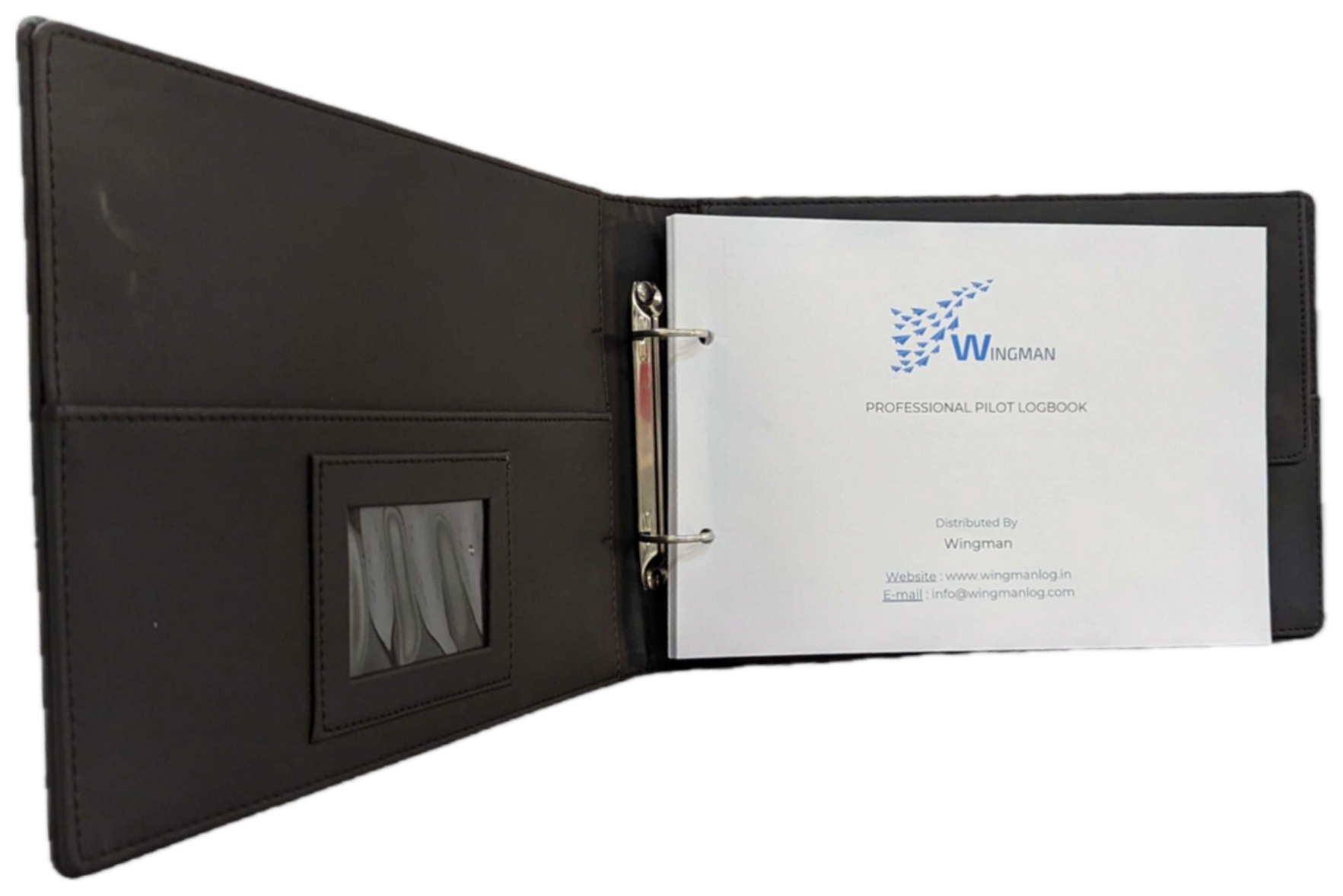 Wingman binder open with a printed logbook insert